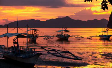Boats during the sunset in El Nido, on Palawan island, Philippines