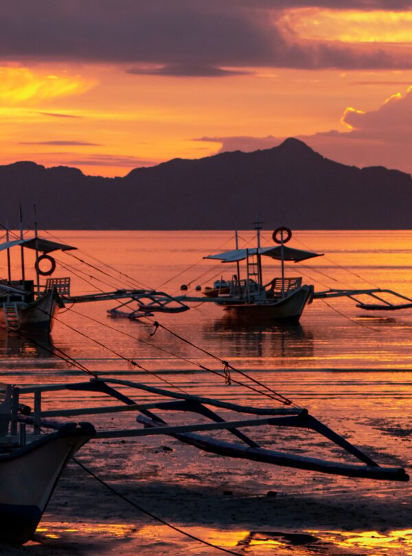 Boats during the sunset in El Nido, on Palawan island, Philippines