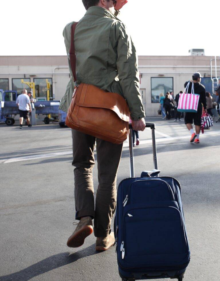 Traveling man on the tarmac